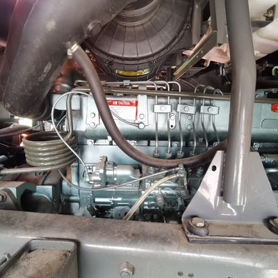 Camion lourd national 8X4 Camion déchargeur direction hydraulique climatiseur cabine incluse