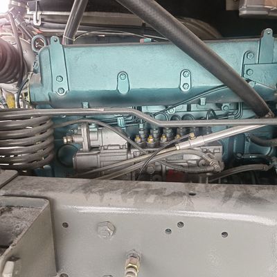 Camion-décharge à transmission manuelle avec pneus et direction hydraulique d'assistance