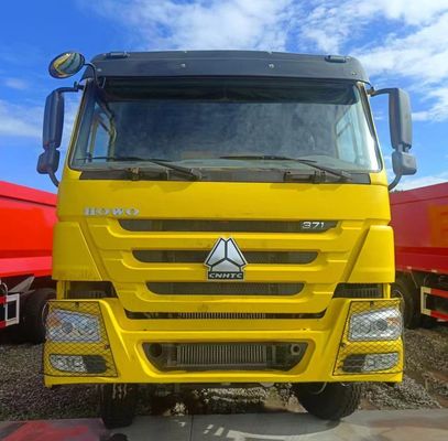 12100.000kg de véhicules d'occasion chinois transport HOWO camion de décharge avec boîte de chargement en acier au carbone
