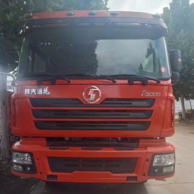 Un camion de chargement d'occasion abordable avec un système de direction hydraulique et une capacité de charge de 21 à 30 tonnes