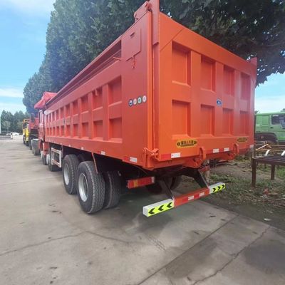 Un camion de chargement d'occasion abordable avec un système de direction hydraulique et une capacité de charge de 21 à 30 tonnes