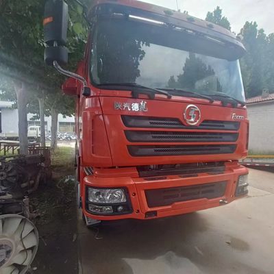 Un camion de chargement d'occasion abordable avec un système de direction hydraulique et une capacité de charge de 21 à 30 tonnes