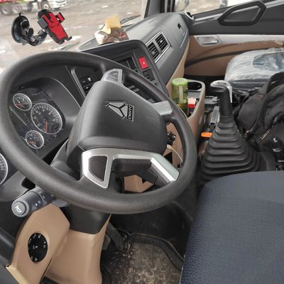 Camion tracteur Sinotruk d'occasion avec boîte de chargement en acier au carbone en bon état
